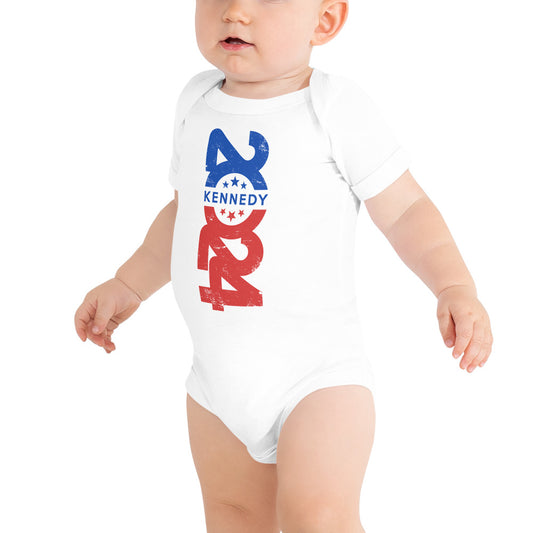 baby wearing the Kennedy 2024 babie onsie with the 2024 logo on the front. 