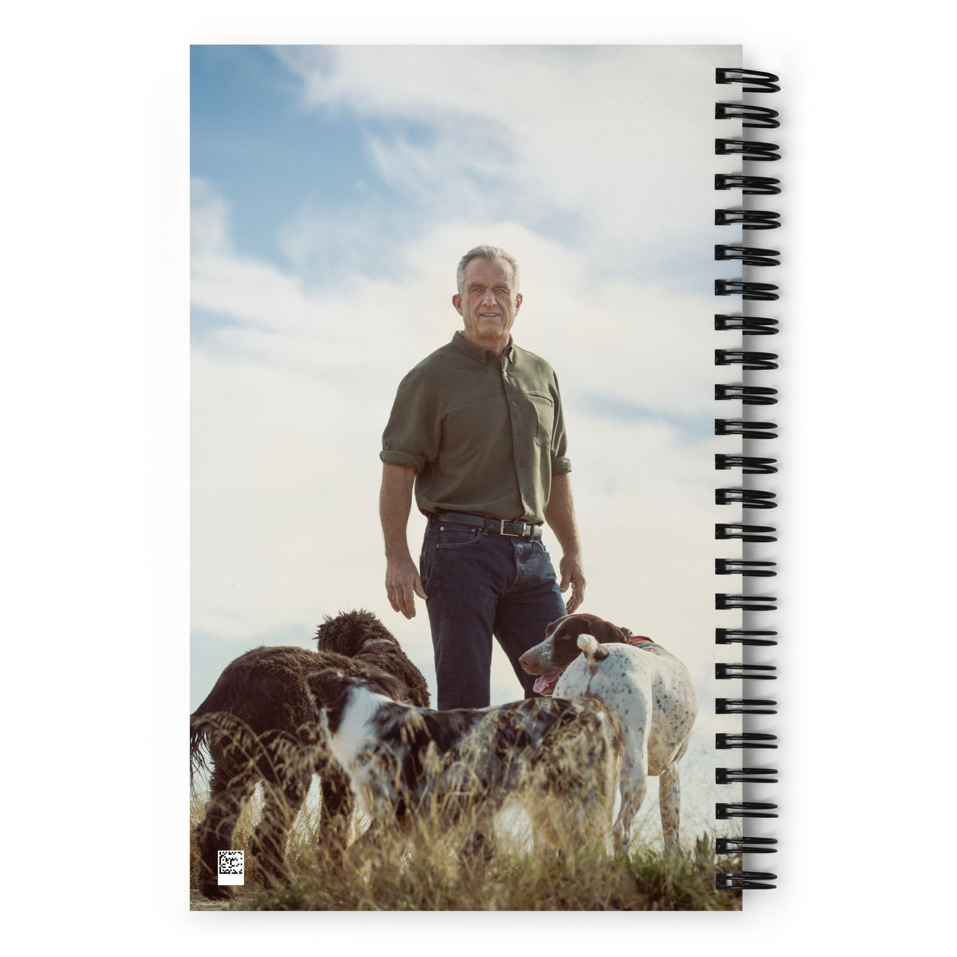 Back of the Kennedy24 navy blue spiral notebook with a photo of RFK Jr. and his dogs.